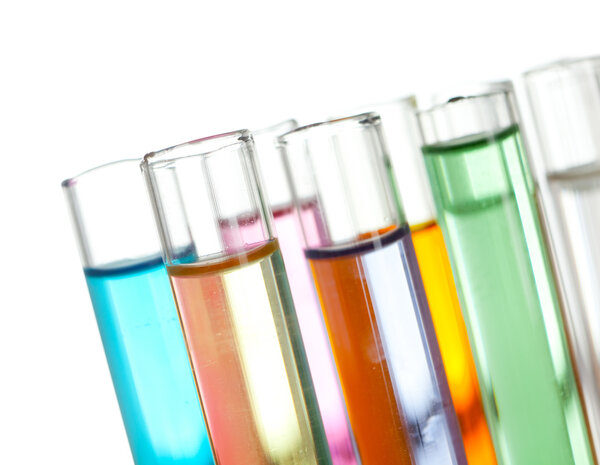 Group of test tubes with a colored liquids in a rack