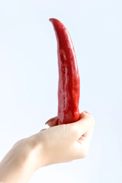 Κόκκινη πιπεριά στο χέρι — Φωτογραφία Αρχείου