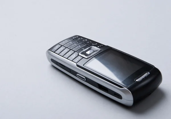 Cellural telefoon geïsoleerd op de grijze achtergrond — Stockfoto
