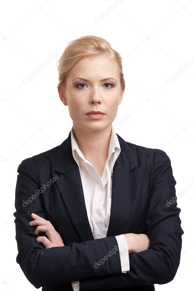 Business woman in a black suit, looking at the camera