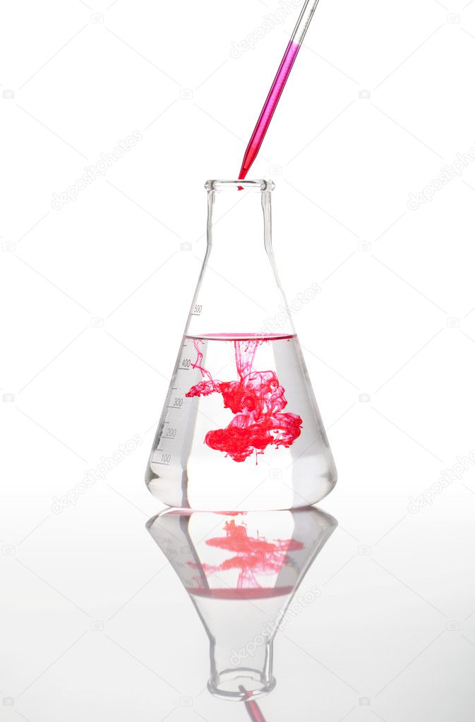 Conical Erlenmeyer laboratory flask with a red liquid
