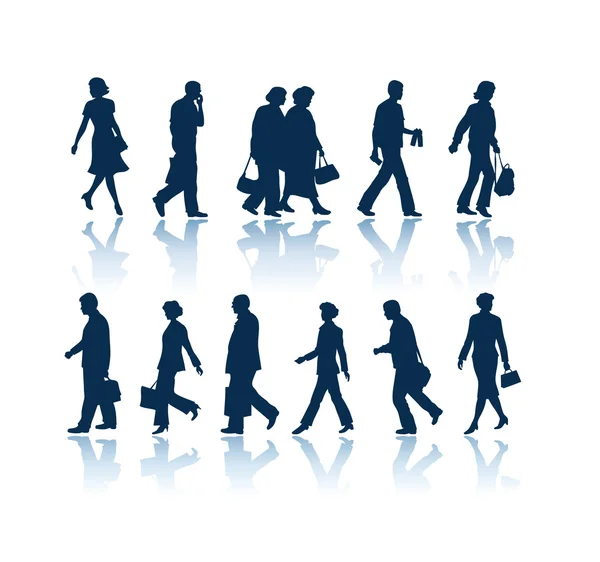 Walking silhouettes — Stock Vector