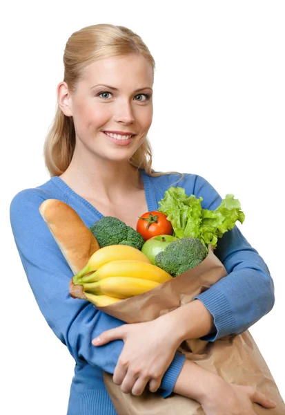 Mladá žena s taškou plnou zdravých potravin — Stock fotografie