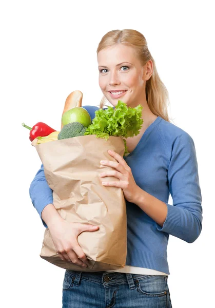 Attraktiv kvinna med en väska full av hälsosamma livsmedel — Stockfoto