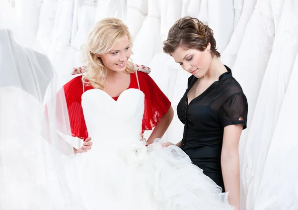 Thinking over a wedding gown — Stock Photo, Image