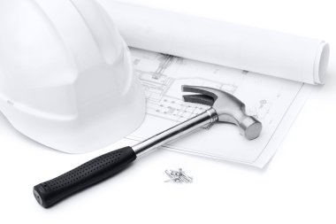 White hard hat, hammer, nails and druft, isolated on white clipart