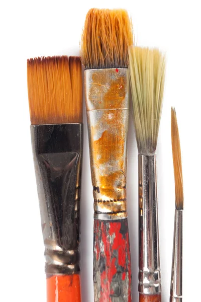 Four paintbrushes, isolated on white — Stock Photo, Image