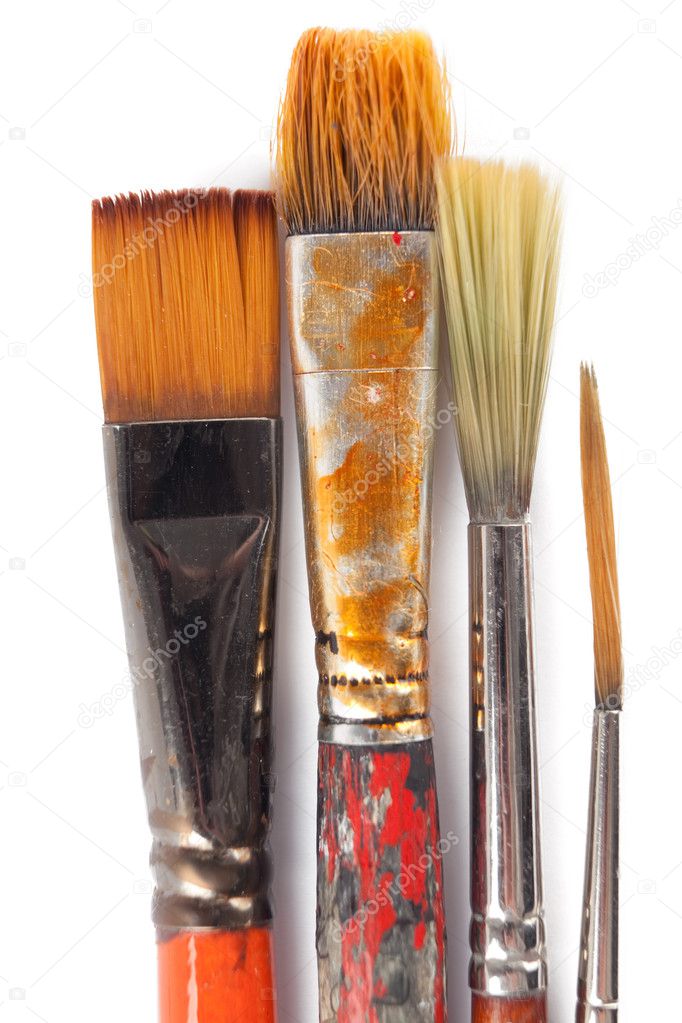 Four paintbrushes, isolated on white
