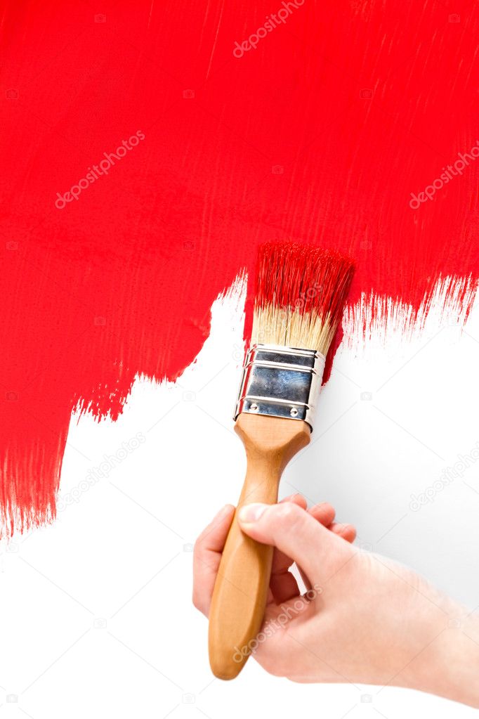 Painting with red ink and paintbrush