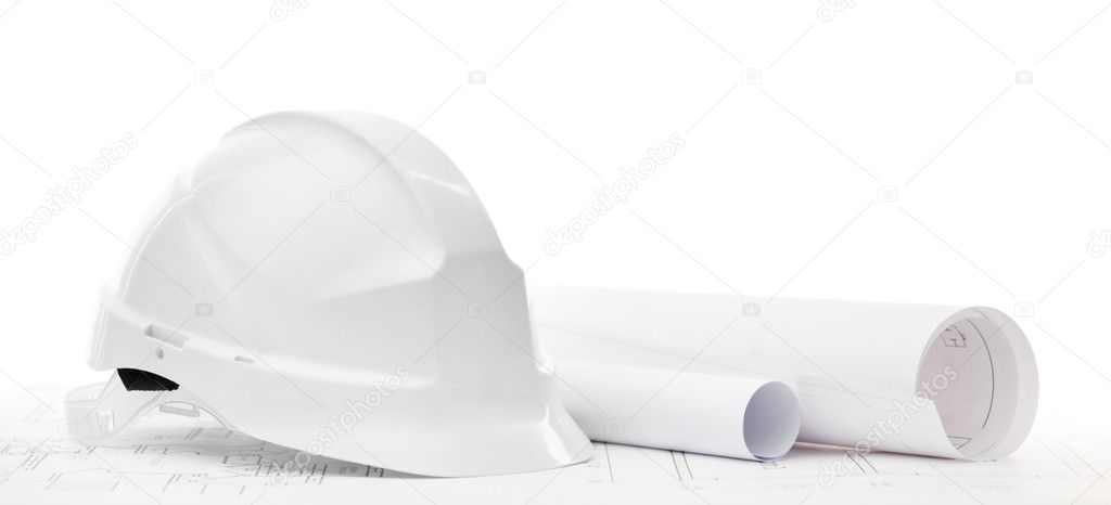 White hard hat near working drawings, isolated on white