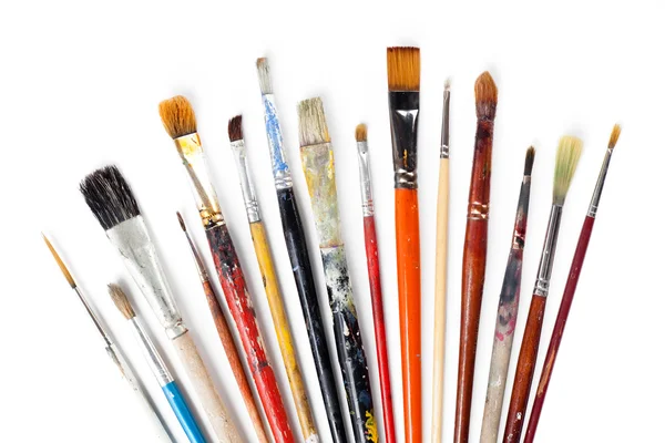 Variety of dirty and clean brushes — Stock Photo, Image