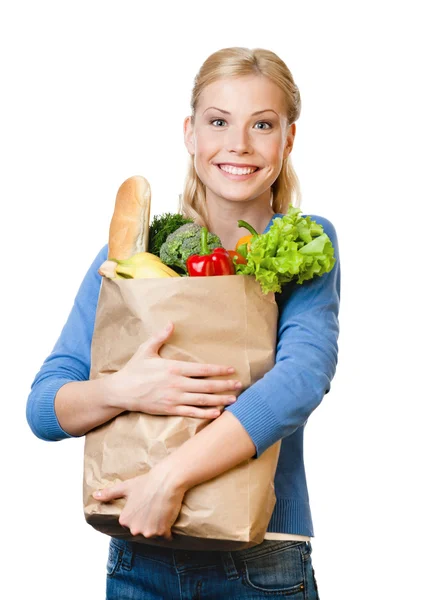 Vacker kvinna med en väska full med sunda matvanor — Stockfoto