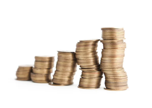 Bronze coins stand vertically in crooked columns — Stock Photo, Image