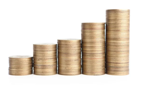 Bronze coins stand vertically in high columns — Stock Photo, Image