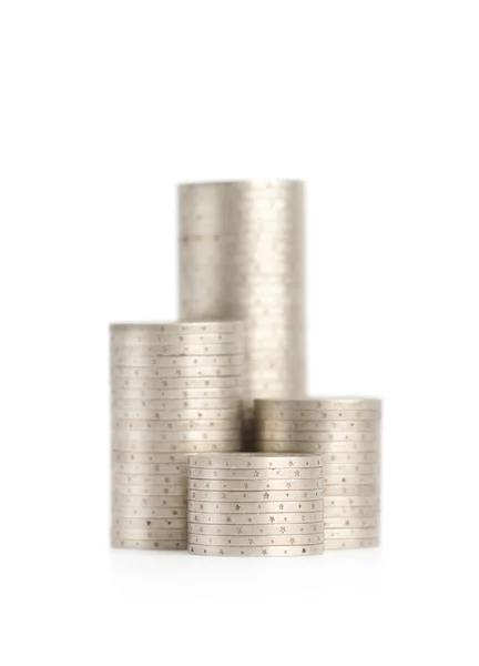 Silver coins stand vertically in columns, isolated — Stock Photo, Image