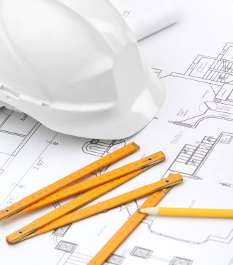 White hard hat near working materials clipart