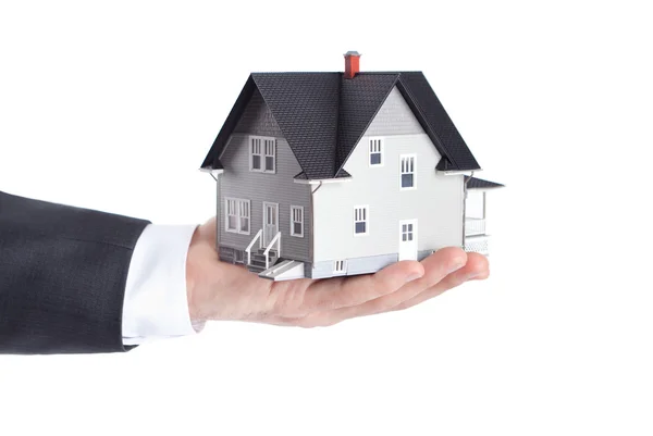 Hand holding house model, isolated — Stock Photo, Image