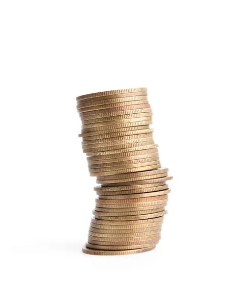 Bronze coins stand vertically in crooked column — Stock Photo, Image