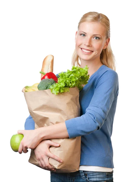 Mujer atractiva con una bolsa llena de alimentación saludable — Foto de Stock