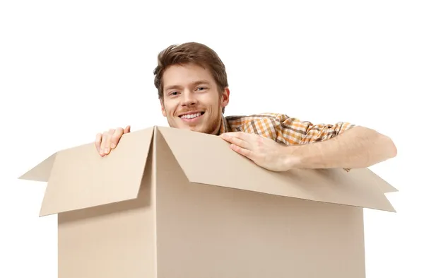 Gömmer sig inuti boxen — Stockfoto