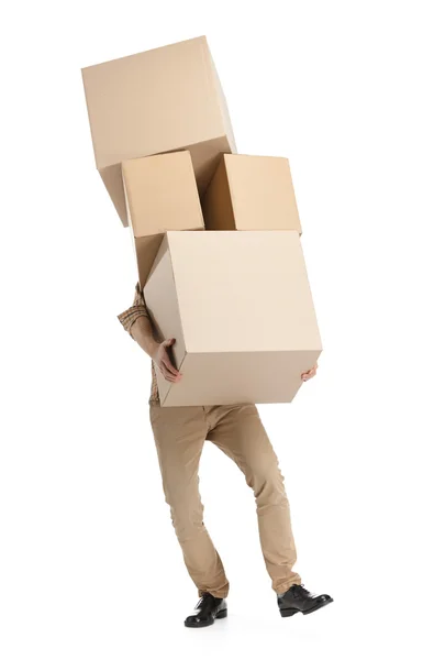 Man hardly carries the boxes — Stock Photo, Image