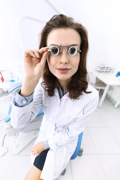 Trying on medical spectacles — Stock Photo, Image