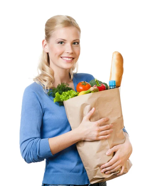 Mujer bonita con una bolsa llena de comida saludable — Foto de Stock