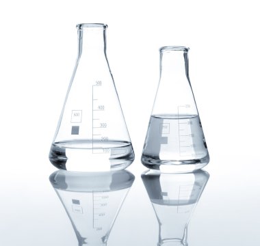 Two laboratory flasks with a clear liquid clipart