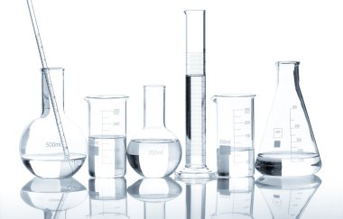 Group of laboratory flasks with a clear liquid clipart