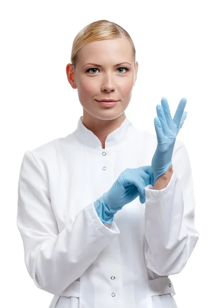 Medic is in blue rubber gloves — Stock Photo, Image