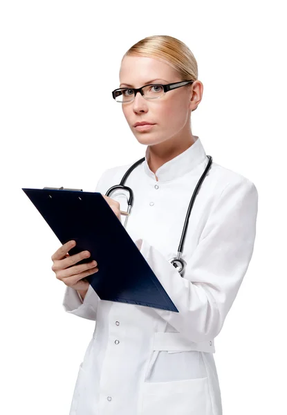 Ženský lékař zapíše do svého poznámkového bloku — Stock fotografie