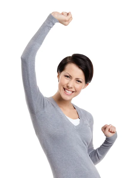Beautiful girl gestures triumphal fists — Stock Photo, Image