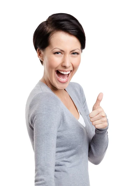 Laughing girl gives thumb up — Stock Photo, Image