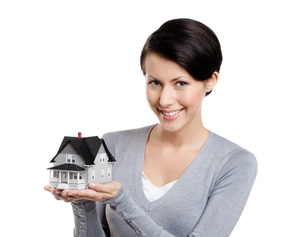 Holding small toy house — Stock Photo, Image
