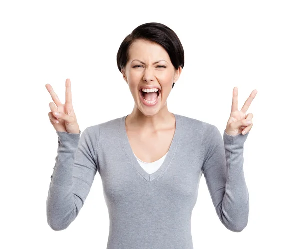 Smiley woman shows peace sign with two hands Stock Photo