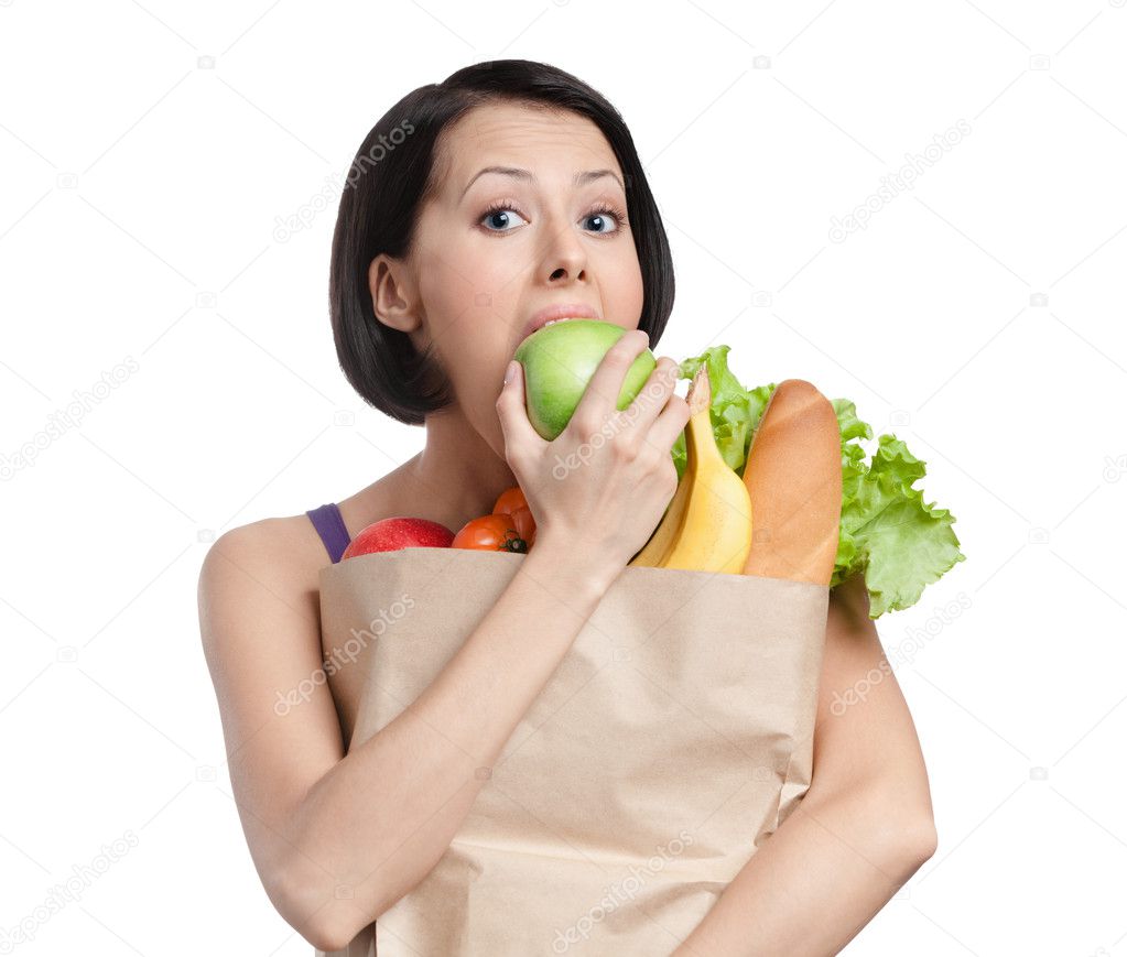 Vegetarian girl eats an apple