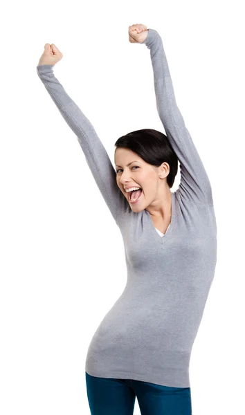 Beautiful girl gesturing triumphal fists puts her hands up — Stock Photo, Image