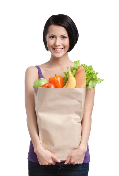 Розумна дівчина з пакетом фруктів та овочів — стокове фото