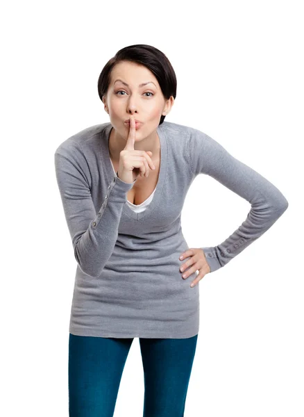 Hübsche Frau zeigt Schweigegegeste mit Zeigefinger — Stockfoto