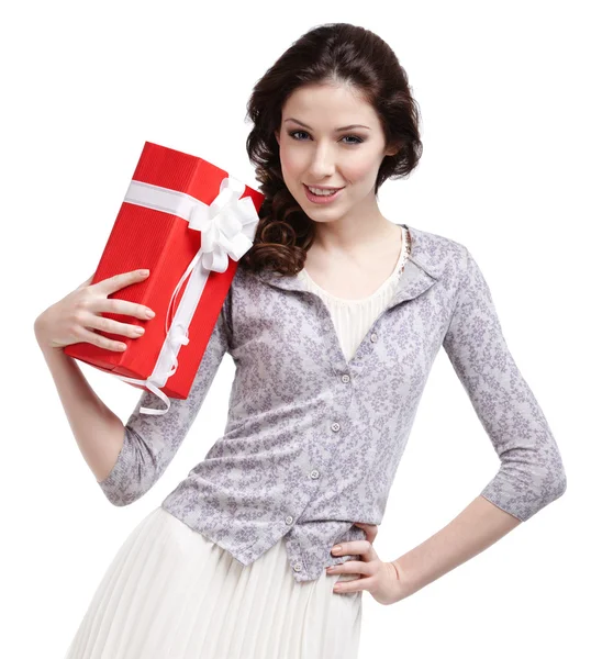 Young woman hands a Christmas gift — Stock Photo, Image