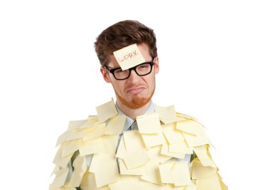 Young man with a sticky note on his face, covered with yellow stickers clipart