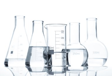 Five classic laboratory flasks with a clear liquid clipart