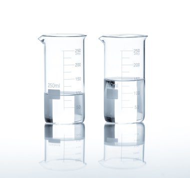 Laboratory flasks with a clear liquid clipart