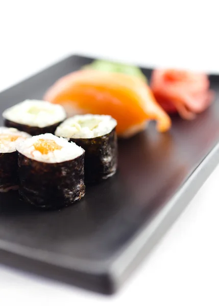 Placa com sushi, isolada — Fotografia de Stock