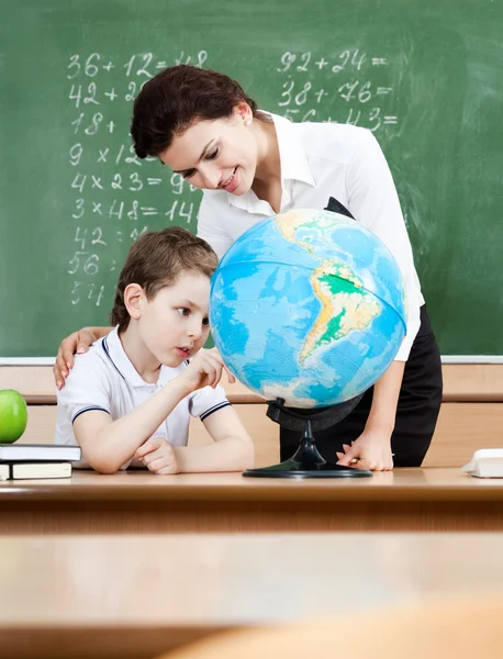 Studying geography with terrestrial globe — Stock Photo, Image
