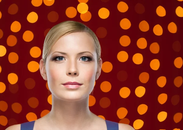 Ritratto di donna con i cerchi luminosi sullo sfondo — Foto Stock