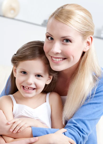 Smiley mummy with her daughter Stock Image