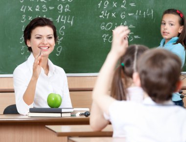 Teacher questions pupils at algebra clipart