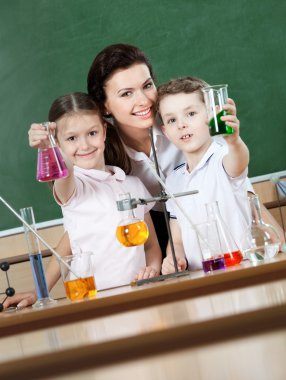 Little pupils learn chemistry clipart