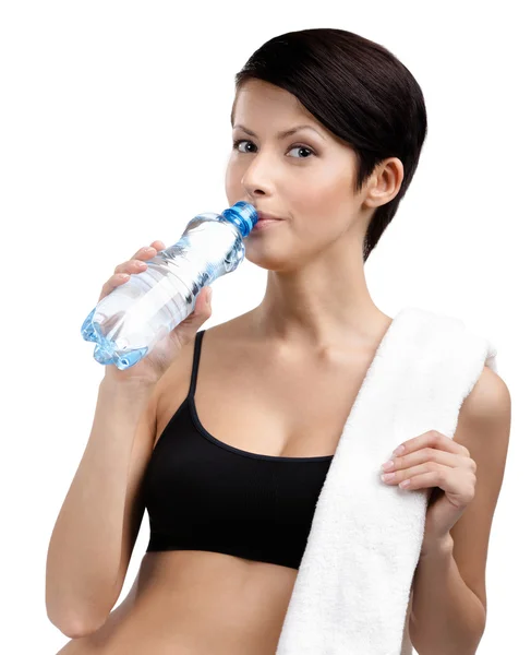 Atletische vrouw met fles water — Stockfoto